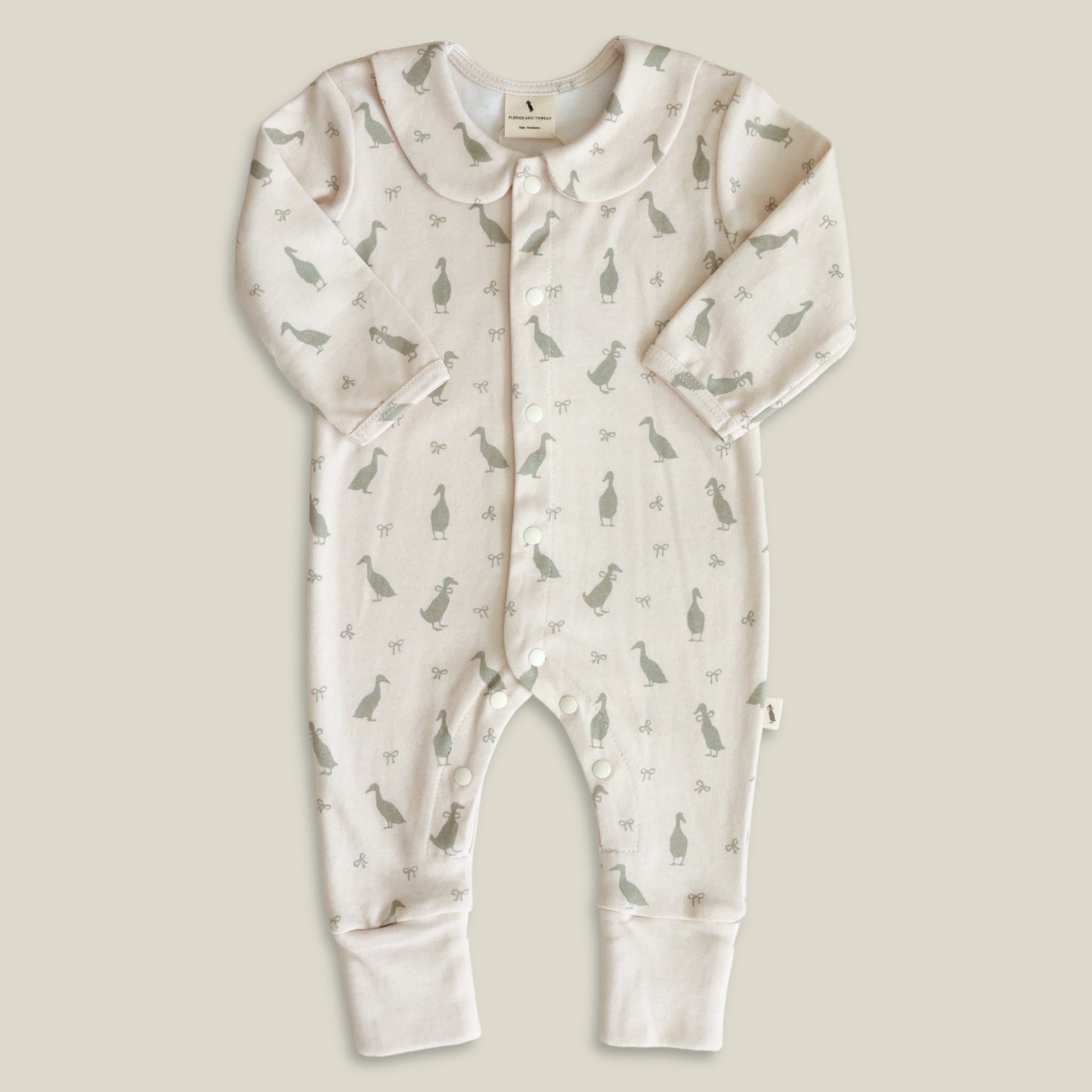 F&T Babygrow Duck Cream 6-12M